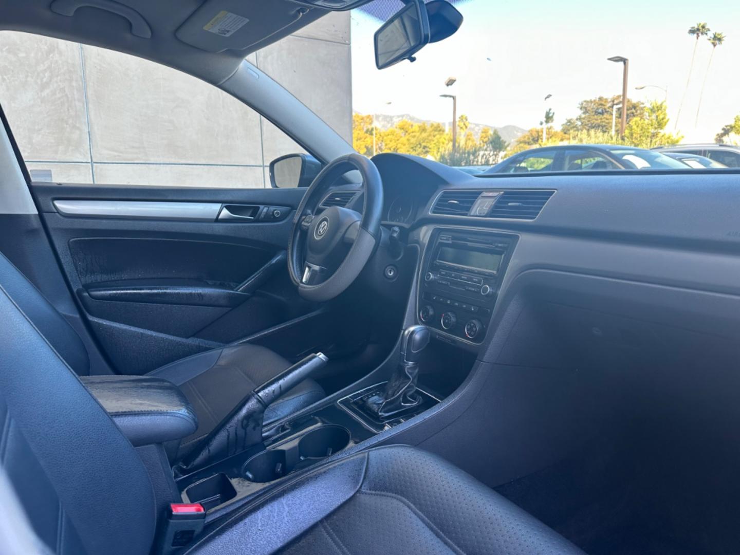 2015 Gray /Black Volkswagen Passat leather (1VWAT7A39FC) with an 4 CYLINDER engine, Automatic transmission, located at 30 S. Berkeley Avenue, Pasadena, CA, 91107, (626) 248-7567, 34.145447, -118.109398 - iscover Refined German Engineering: 2015 VW Passat Wolfsburg Edition - Now at Our Pasadena, CA Dealership Embrace the perfect blend of luxury and performance with the 2015 VW Passat Wolfsburg Edition, available at our BHPH dealership in Pasadena, CA. This exquisite model symbolizes Volkswagen's c - Photo#7